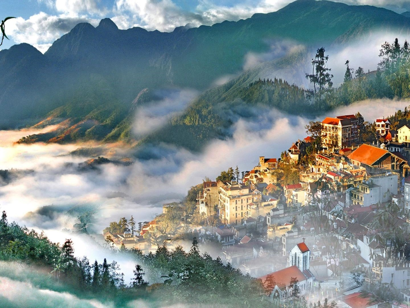 From above, clouds and fog embrace Sapa town